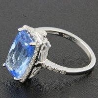 Blue Topaz and Diamond Ring