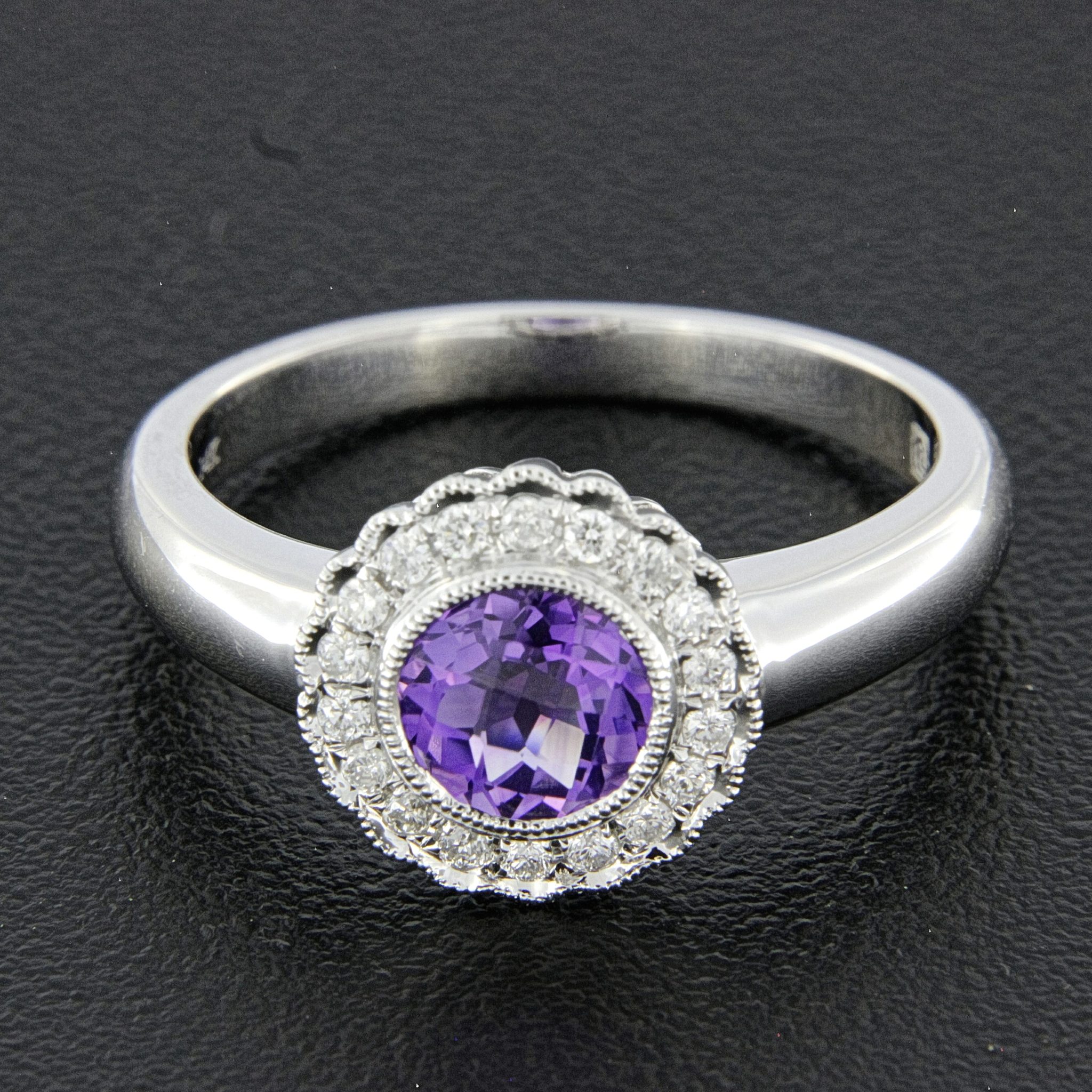 Amethyst and Diamond Halo Ring Amethyst and Diamond Halo Ring